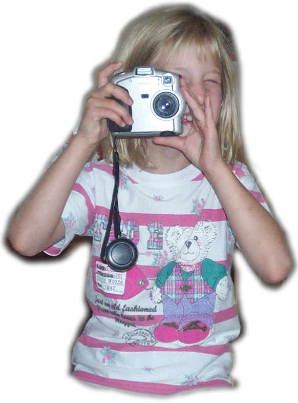 Baby me posed with a camera, always connected to tech